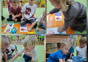 Dzieci kodują trasę robota na kolorowej planszy z obrazkami, literami i cyframi w sali przedszkolnej.